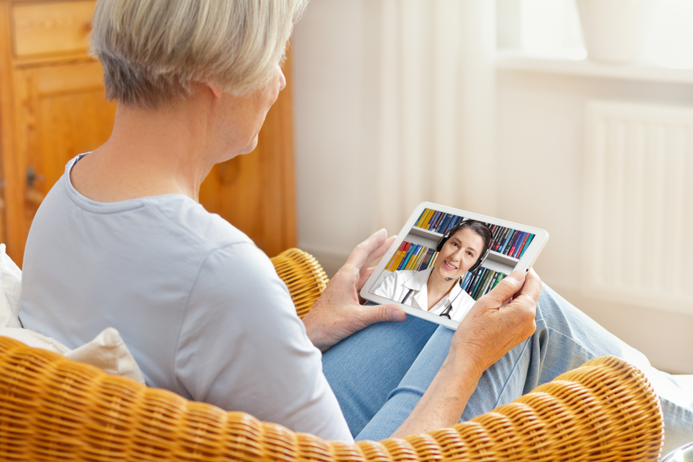 Telemedicine,Concept,,Old,Woman,With,Tablet,Pc,During,An,Online